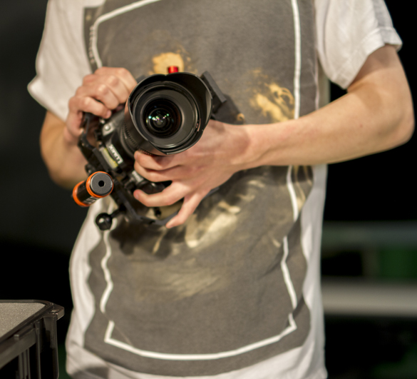 Media Entertainment Arts student holding camera.