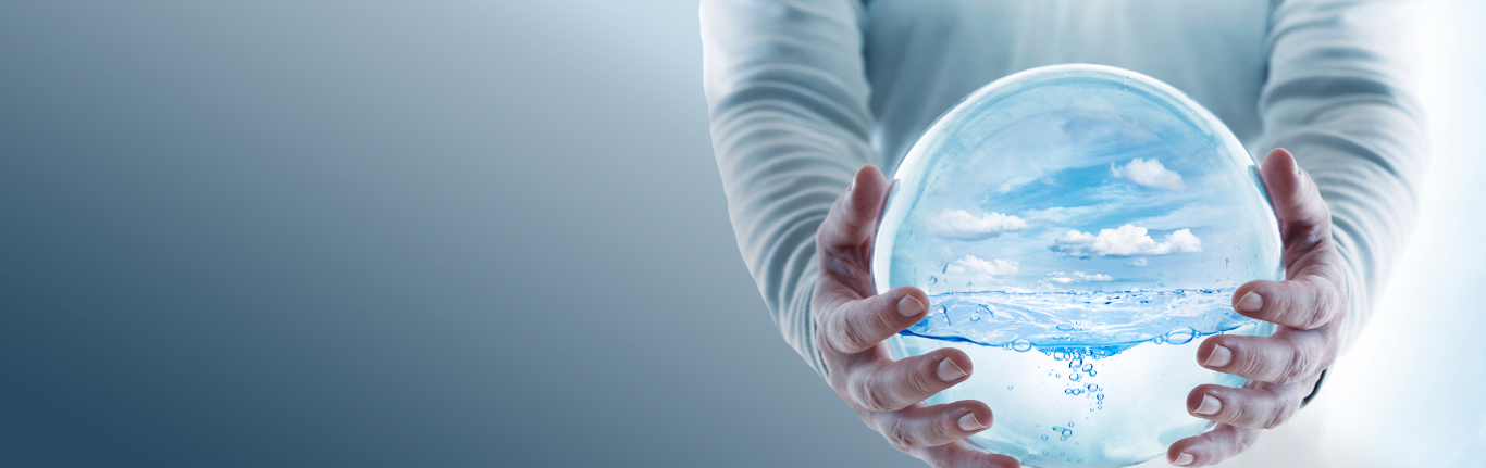 Water Systems Technolgy - Man holding water globe.