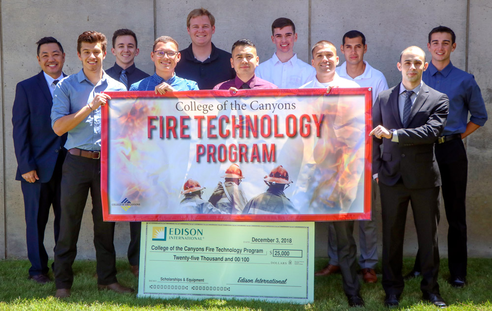 Fire technology students pose with a check from Edison International