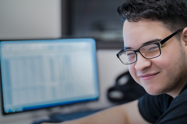 Student learning Electronic Systems software. 