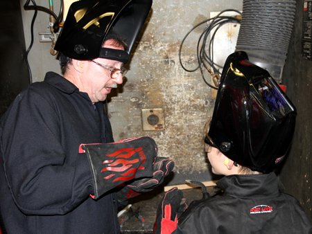 Boy Scouts participating in projects at COC's Welding Department. 