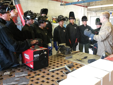 Boy Scouts participating in projects at COC's Welding Department. 