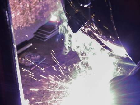 Boy Scouts participating in projects at COC's Welding Department. 