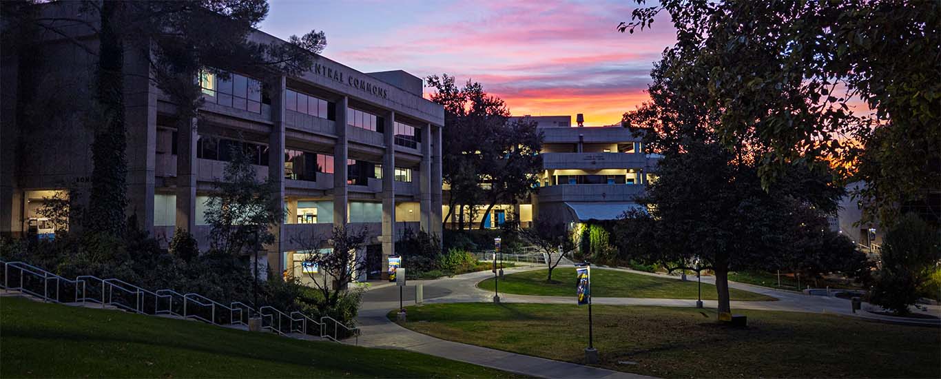 Bonelli Hall and the Honor Grove at sunset