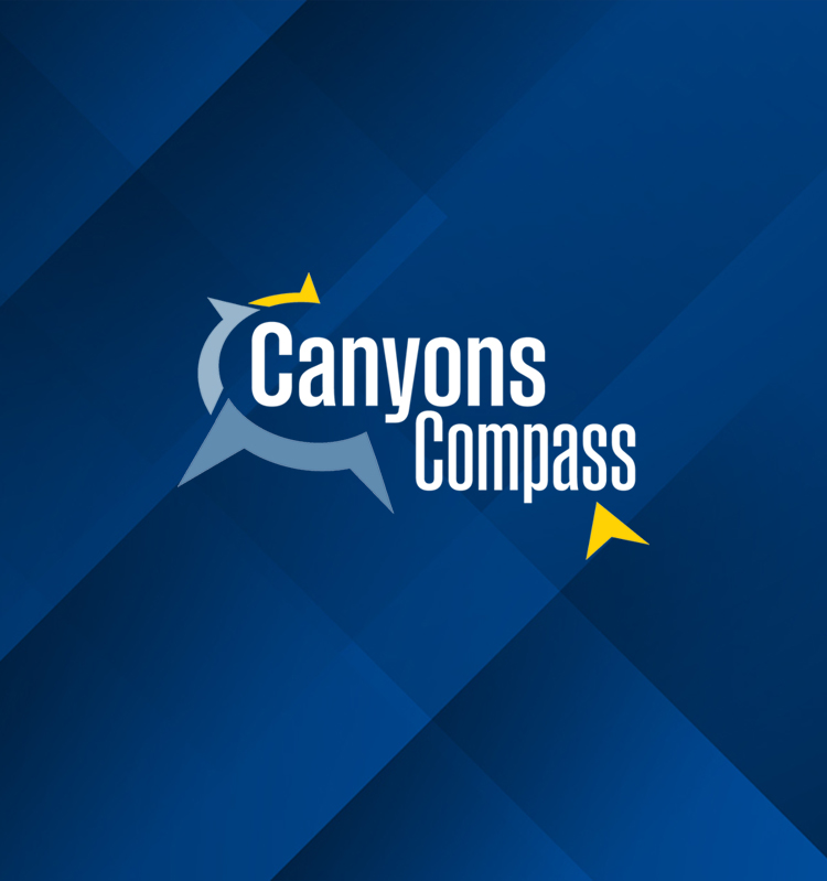 Canyons Compass logo on an abstract blue background.