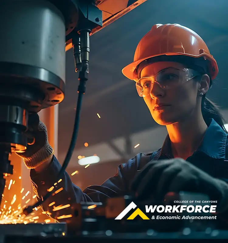 A woman performs manufacturing work. Image includes logo for Workforce and Economic Advancement