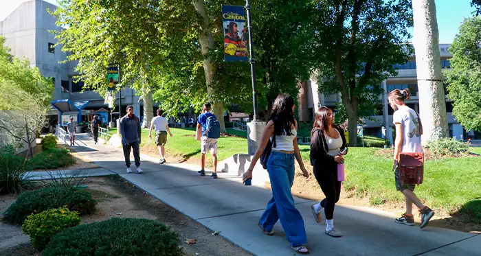 Students traverse a walkway at the Valencia campus.