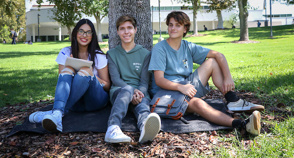 Students Next to Tree