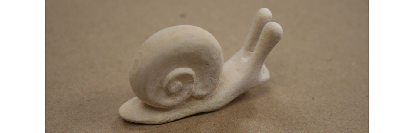 snail carved from wood