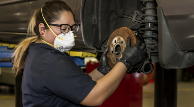 Student working on the brakes.