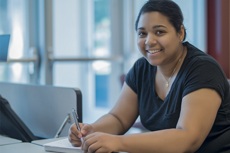 Business student working in class. 