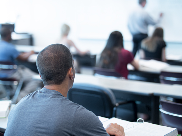 Buisness students listening to instructor. 