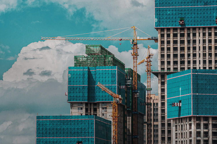 Highrise construction with cranes.