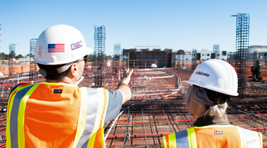 Construction workers at work site.