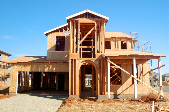 Exposed wood framing of house.