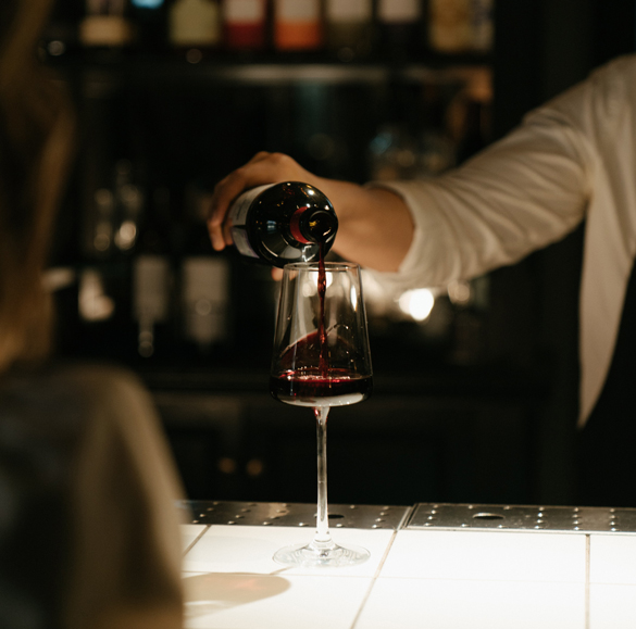 Wine being poured.