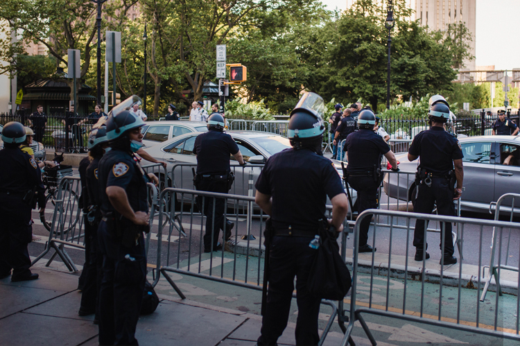 Riot police protecting citizens.