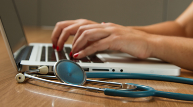 Nurse on the computer.