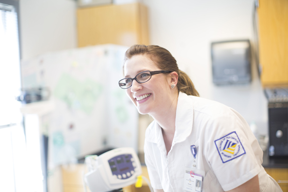 Nursing student in lab.