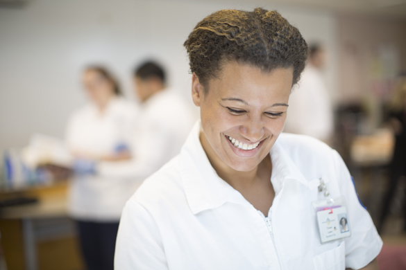 Nursing student in lab.