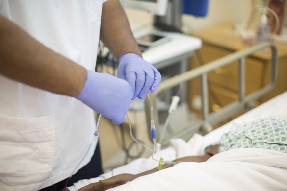 Nursing student in lab.