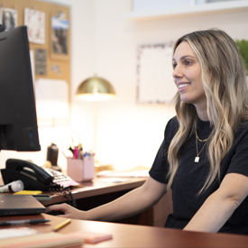 Staff coordinator on computer