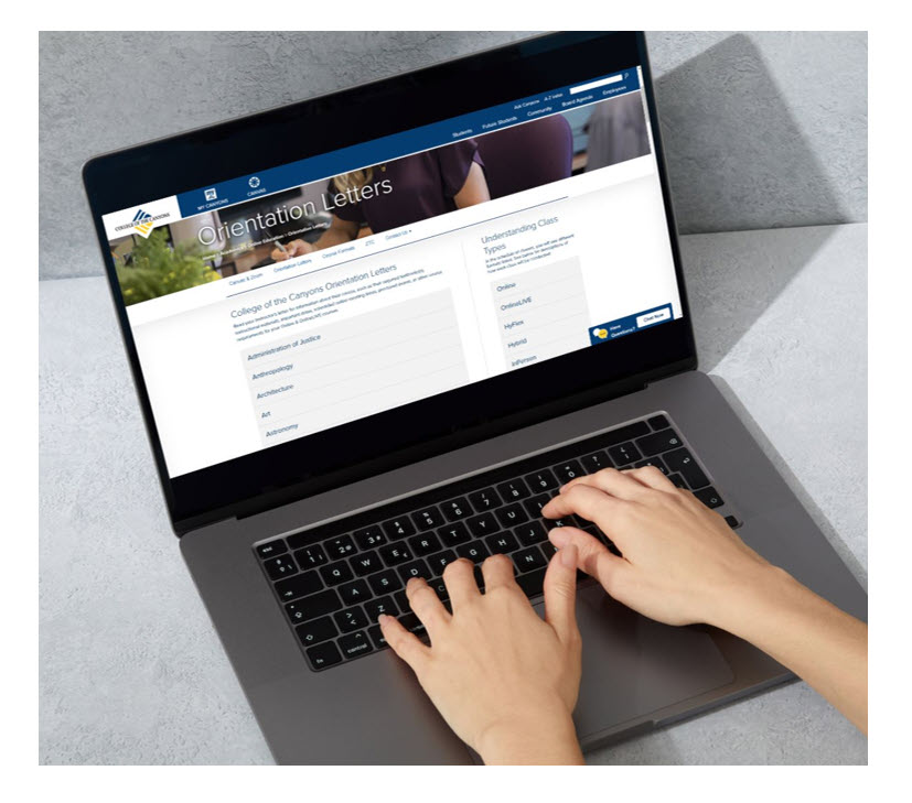 laptop showing student-facing orientation letter website