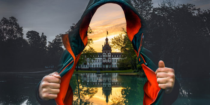 Photoshop of person in hoodie with building showing through