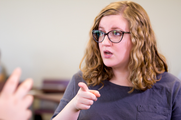 Students using sign language. 