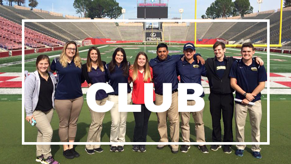 Sports Medicine students posing on football field.