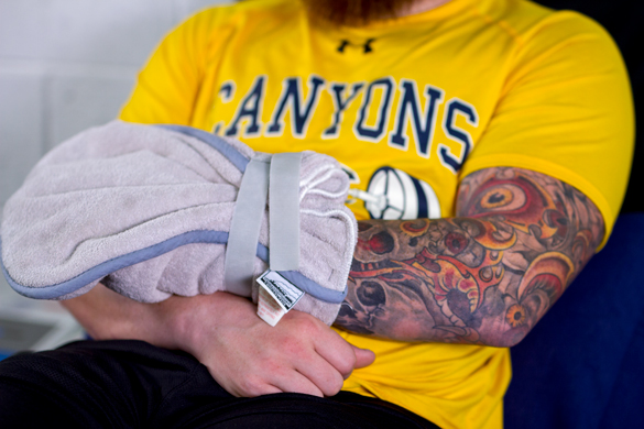 Sports Medicine student getting hand wrap therapy.  