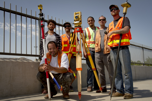 Members of CRC’s team work on the Community Gardens’ land surveying project.