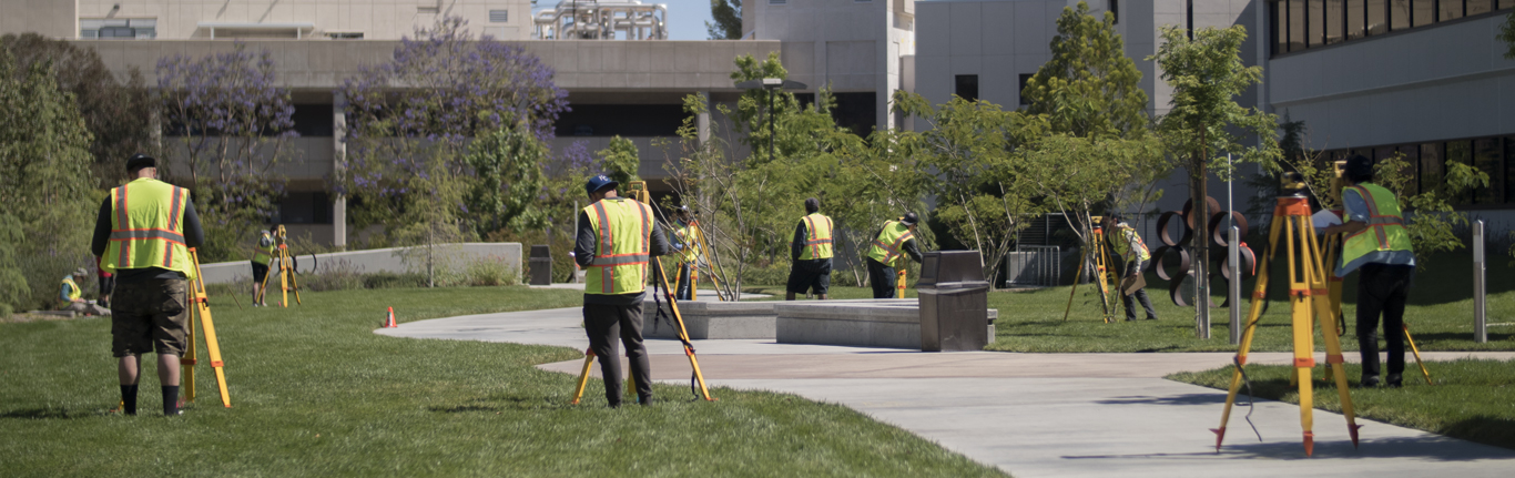 Land Surveying students learning surveying equipment. 