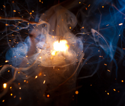 Welding smoke and sparks.