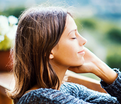 Calm woman in peaceful setting