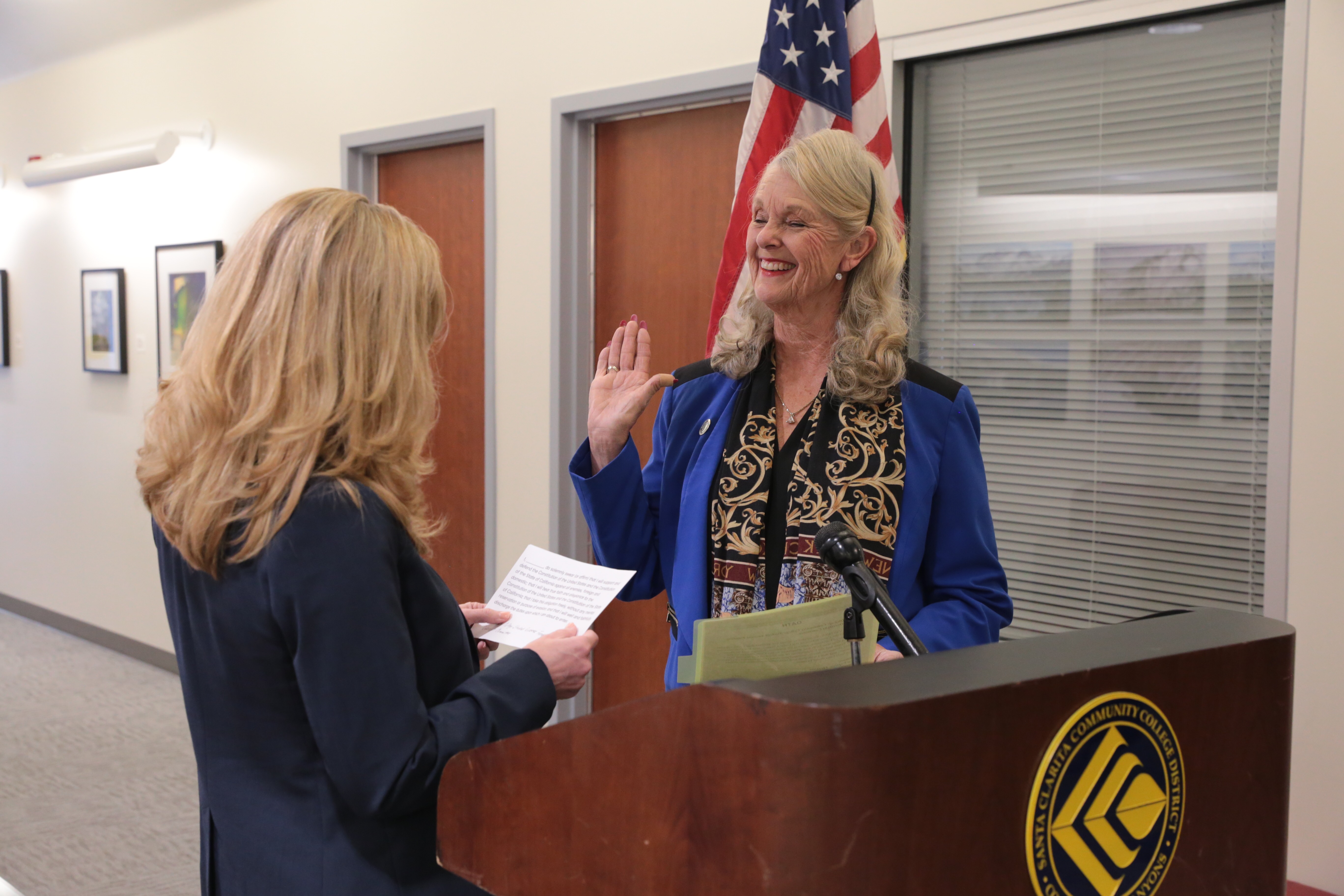 Chancellor Van Hook is sworn in by Assemblywoman Christy Smith.