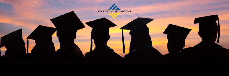 sillouette of graduation hats on students at sunset