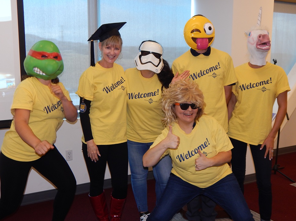 the LEAP welcome day team in silly masks and posing