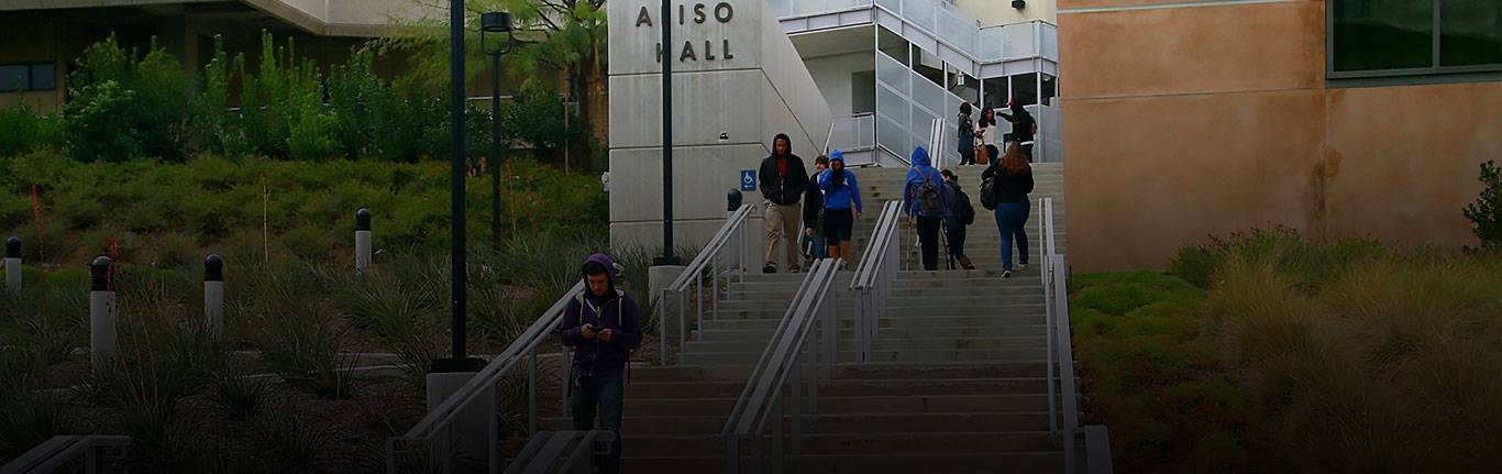 Students walking up the stairs to Aliso Hall