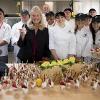 COC Chancellor, Dr. Dianne G. Van Hook with Chef Hervé, Chef Kristianne, and students.